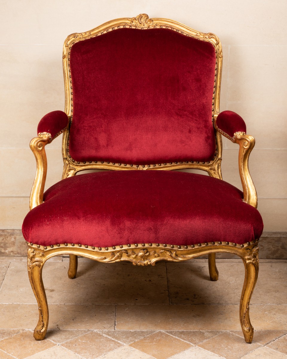 Giltwood Louis XV fauteuil (armchair) with neoclassical details 1765 (via  Mallett Antiques)