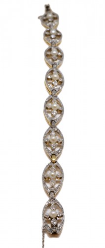 Bracelet in gold, platinum, diamonds and pearls