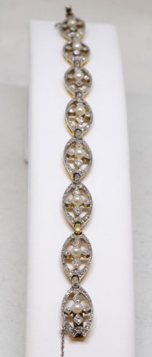 Bracelet in gold, platinum, diamonds and pearls - 