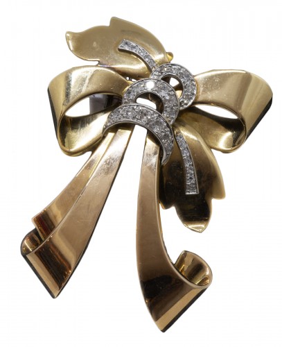 Broche noeud en or et diamants