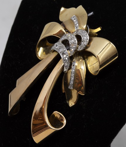 Antique Jewellery  - 18K gold and diamonds knot brooch