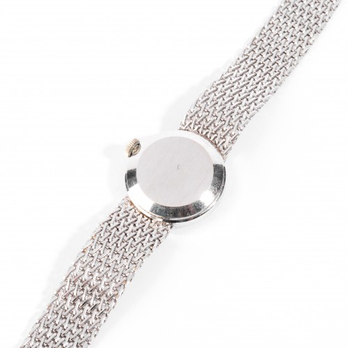 Montre en or sertie de petits diamants - 