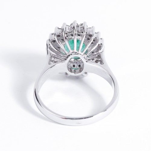 20th century - white gold ring set with an emerald and small diamonds