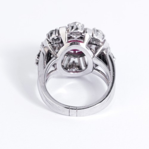 Platinum ring set in its center with a cabochon ruby and diamonds - 