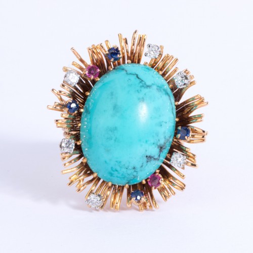 20th century - Gold ring set in its center with turquoise and small diamonds and sapph