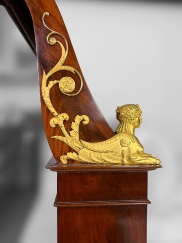 Antiquités - Empire cherry wood "Lit en bateau" attributed to the workshop of P. Marcion, circa 1810