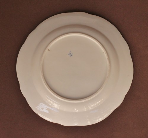 18th century - Plate in soft porcelain of Sevres with green background, marked F for 1759