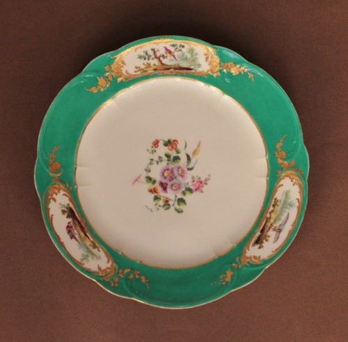  - Plate in soft porcelain of Sevres with green background, marked F for 1759