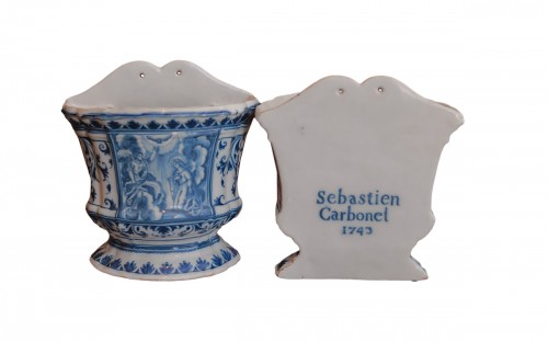 Pair of Marseille earthenware bouquetières, marked and dated 1743.
