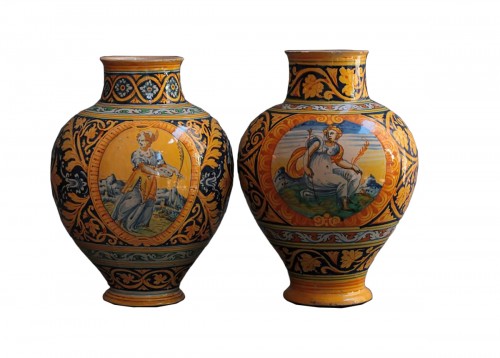 Two majolica vases from Faenza with &quot;a quartieri&quot; decoration and a saint. 1