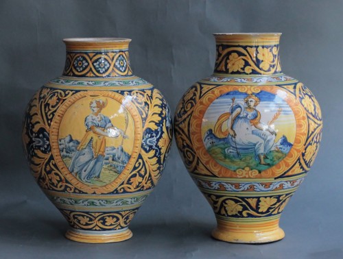 Porcelain & Faience  - Two majolica vases from Faenza with &quot;a quartieri&quot; decoration and a saint. 1