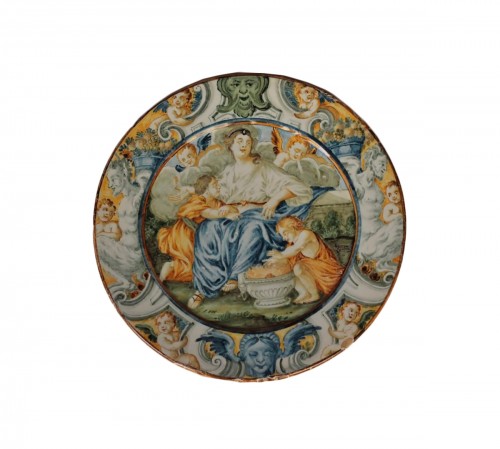 Castelli earthenware plate depicting Charity, Gentili workshop c. 1685-95