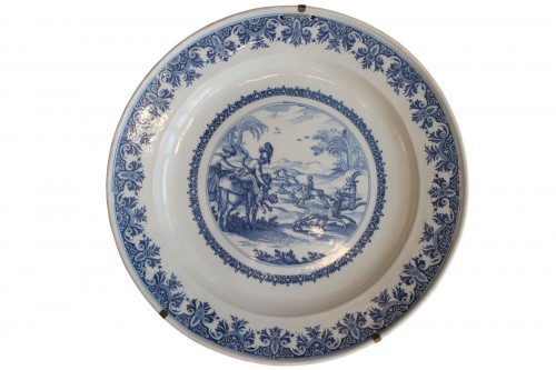 Large Moustiers earthenware dish depicting a gazelle hunt. Circa 1710-20.