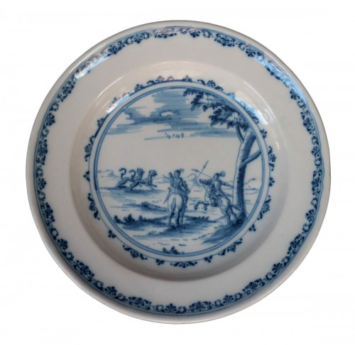 Moustiers faience, plate with a Tempesta scene of hunting cheetahs. 18th c.