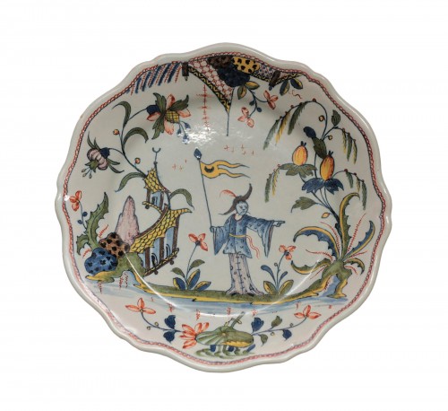 Rouen, plate with a chinese and a flag, vers 1750