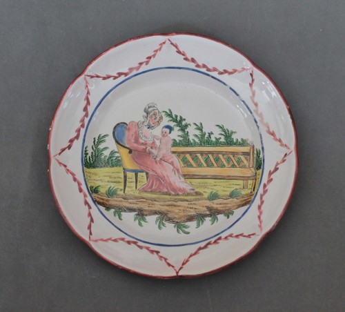 Céramiques, Porcelaines  - Assiette en faïence des Islettes, atelier de Dupré, débu du XIXe siècle.