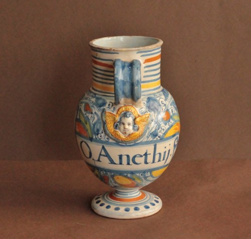 Chevrette in Montpellier earthenware with a molded angel&#039;s head - Porcelain & Faience Style 