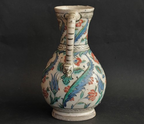 Porcelain & Faience  - Iznik siliceous ceramic pitcher, circa 1585-1600.