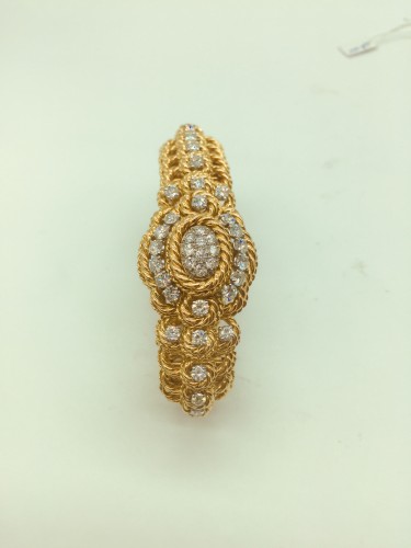 Bracelet montre en or et diamants signé REGNIER vers 1960 - Bijouterie, Joaillerie Style Années 50-60