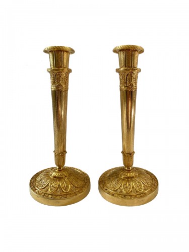 Pair of Charles X gilt bronze flambeaux