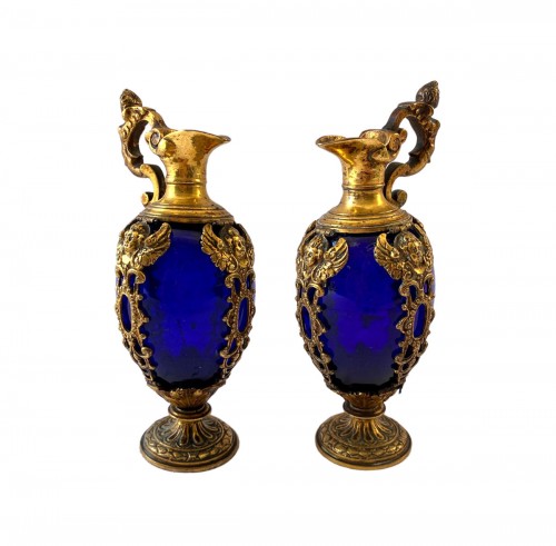 Pair of blue glass and gilt bronze ewers Italy circa 1600