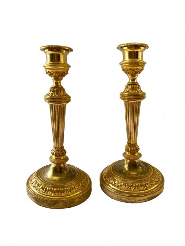 Pair of gilt bronze Directoire candlesticks