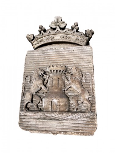 Carved stone coat of arms