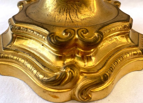 XVIIIe siècle - Paire de flambeaux régence en bronze doré