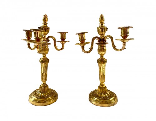 Paire de chandeliers Louis XVI en bronze doré