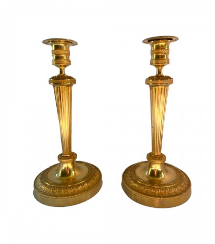 Pair of gilt bronze Directoire candlesticks