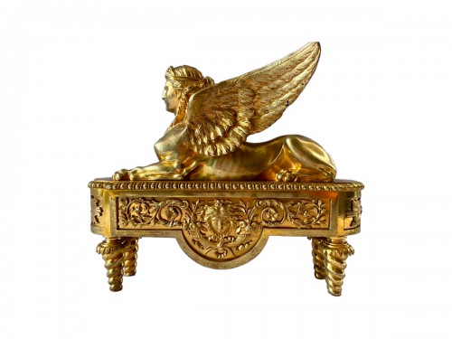 Pair of ormolu andirons with sphinxes circa 1830