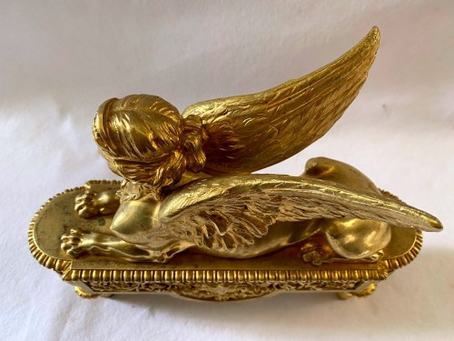 Antiquités - Pair of ormolu andirons with sphinxes circa 1830