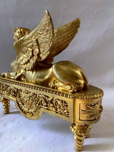 Antiquités - Pair of ormolu andirons with sphinxes circa 1830