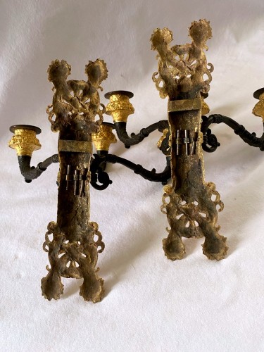Antiquités - Paire d'appliques Empire en bronze doré et patiné