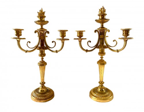 Paire de chandeliers Directoire en bronze doré