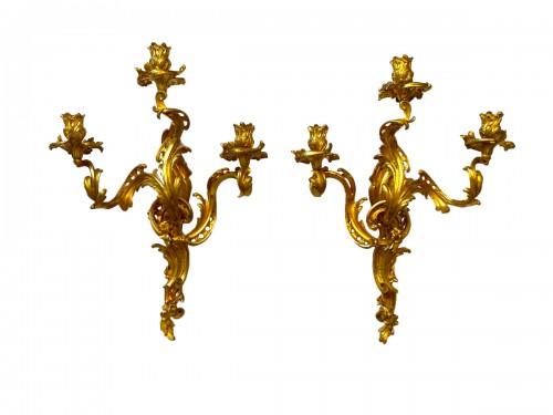 Paire d'applique Louis XV en bronze doré attribué à  Caffieri