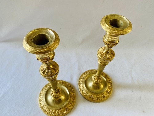 Antiquités - Paire de grands flambeaux Directoire en bronze doré