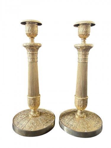 Paire de flambeaux Empire en bronze doré