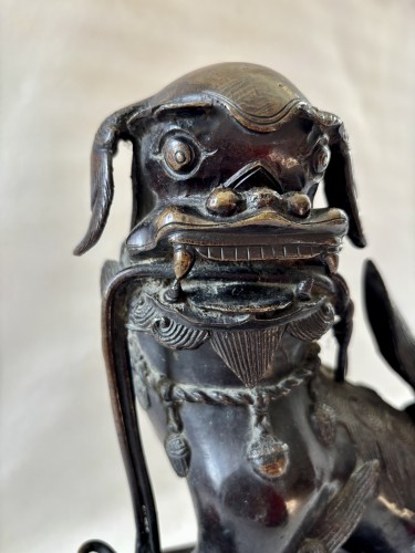 XIXe siècle - Paire de chien de Fô en bronze patiné fin 19e siècle