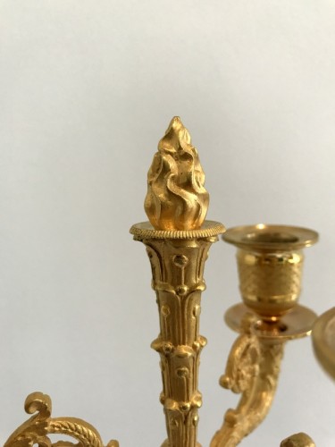 Antiquités - Paire de candélabres Empire en bronze doré
