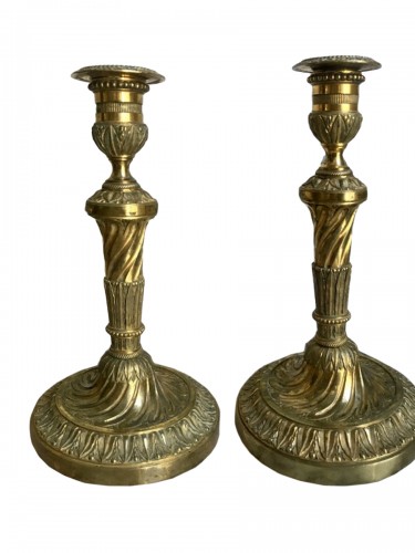 Paire de flambeaux Louis XVI en bronze doré