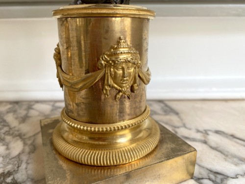 Antiquités - Paire de chandeliers Directoire en bronze doré