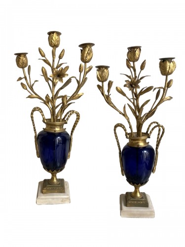 Pair of Louis XVI candlesticks in blue glass and gilt bronze