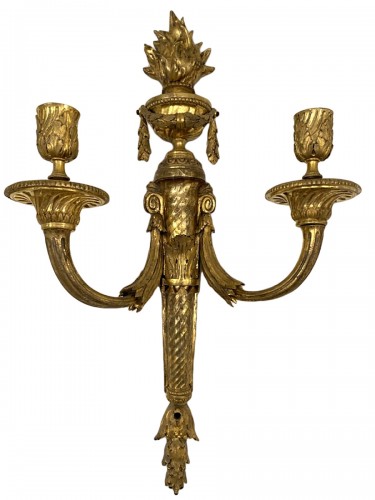 Pair of Louis XVI gilt bronze sconces after Prieur
