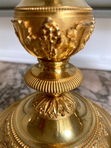 Paire de flambeaux Directoire en bronze doré - Jullion Antiquités