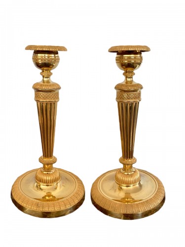 Pair of Empire gilt bronze candlesticks