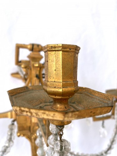 Chandelier du XVIIe siècle en bronze doré et cristal de roche - Jullion Antiquités