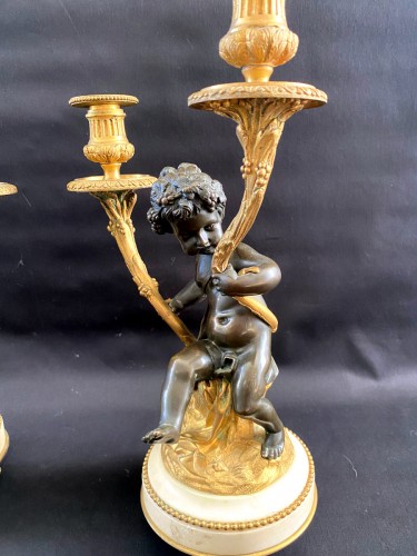 19th century - Pair of bronze candelabras with cherubs