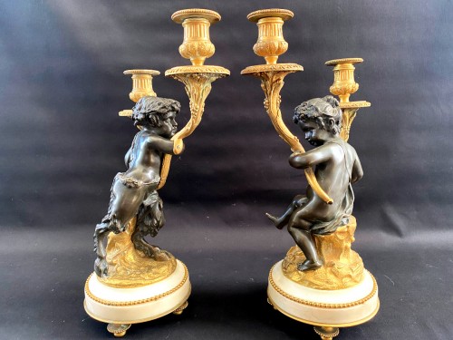 Antiquités - Pair of bronze candelabras with cherubs