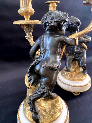 Antiquités - Pair of bronze candelabras with cherubs